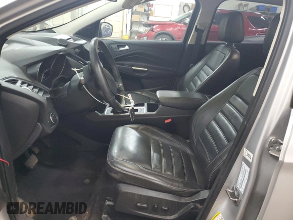 2017 Ford Escape Titanium with VIN 1FMCU0JD6HUE70200, listed as a Copart auction lot 49141595 with 92,159 mi miles and Salvage Title. Bid and sale history available at DreamBid. Image 7.