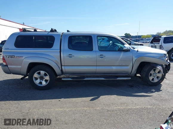 2014 Toyota Tacoma with VIN 3TMLU4EN7EM146705, listed as a IAAI auction lot 41949827 with 147,887 mi miles and . Bid and sale history available at DreamBid. Image 13.