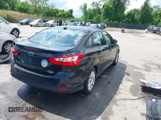 2012 Ford Focus SE with VIN 1FAHP3F24CL107411, listed as a IAAI auction lot 42177334 with 89,242 mi miles and . Bid and sale history available at DreamBid. Image 4.