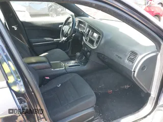 2012 Dodge Charger SE with VIN 2C3CDXBGXCH298176, listed as a IAAI auction lot 42138725 with 128,717 mi miles. Bid and sale history available at carsss.com. Image 5.