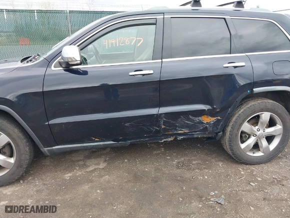 2011 Jeep Grand Cherokee Limited with VIN 1J4RR5GT4BC636541, listed as a IAAI auction lot 41912877 with 127,482 mi miles. Bid and sale history available at carsss.com. Image 6.