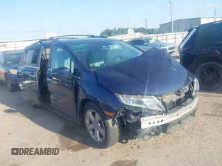 2019 Honda Odyssey EX-L with VIN 5FNRL6H75KB054465, listed as a IAAI auction lot 41841488 with 141,790 mi miles. Bid and sale history available at carsss.com. Image 1.