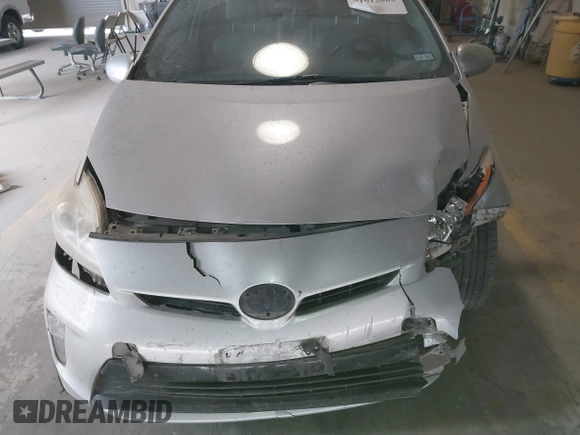 2015 Toyota Prius Four z VIN JTDKN3DU2F1938125, wystawiony jako IAAI lot #41612003 z przebiegiem 282 090 mil mil oraz . Historia ofert i sprzedaży dostępna na DreamBid. Obrazek 13.
