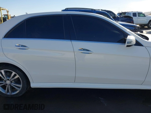 2014 Mercedes-Benz E-Class E 250 BlueTEC Luxury with VIN WDDHF0EB1EA873470, listed as a IAAI auction lot 41406978 with 98,515 mi miles. Bid and sale history available at carsss.com. Image 14.