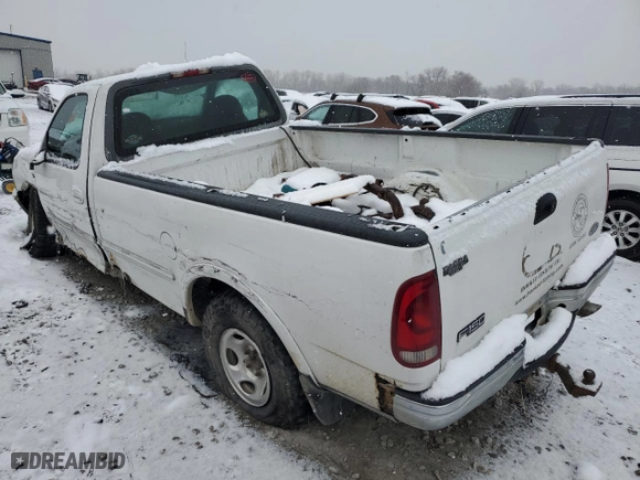 1998 Ford F-150 Standard with VIN 1FTRF18L9WNB61551, listed as a Copart auction lot 82864544 with 0 mi miles and Salvage Title. Bid and sale history available at carsss.com. Image 2.