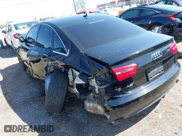 2013 Audi A6 2.0T Premium Plus with VIN WAUDFAFC5DN056383, listed as a IAAI auction lot 42023949 with 128,118 mi miles. Bid and sale history available at carsss.com. Image 3.