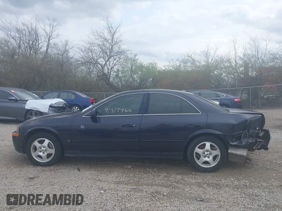 2000 Lincoln LS with VIN 1LNHM87A6YY879355, listed as a IAAI auction lot 41917760 with 70,457 mi miles. Bid and sale history available at carsss.com. Image 14.