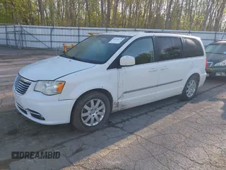2013 Chrysler Town & Country Touring with VIN 2C4RC1BG6DR540964, listed as a IAAI auction lot 42215779 with 218,141 mi miles and . Bid and sale history available at DreamBid. Image 2.