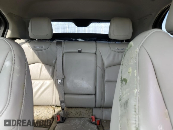 2019 Cadillac XT4 FWD Premium Luxury z VIN 1GYFZCR42KF147440, wystawiony jako Copart lot #45549835 z przebiegiem Nie podano mil oraz Szkody całkowita. Historia ofert i sprzedaży dostępna na DreamBid. Obrazek 10.