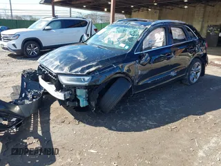 2015 Audi Q3 Premium Plus z VIN WA1EFCFS4FR001441, wystawiony jako IAAI lot #41813239 z przebiegiem 112 795 mil mil oraz . Historia ofert i sprzedaży dostępna na DreamBid. Obrazek 17.
