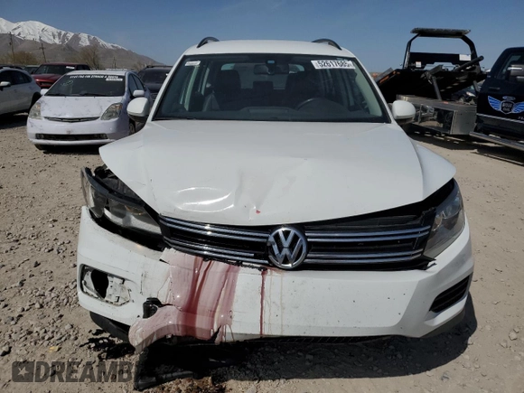 2017 Volkswagen Tiguan S with VIN WVGBV7AX8HK028302, listed as a Copart auction lot 52617685 with 108,191 mi miles and Salvage Title. Bid and sale history available at DreamBid. Image 5.