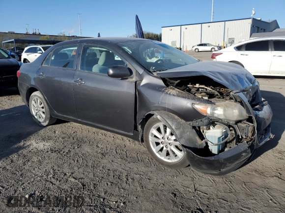 2010 Toyota Corolla with VIN 2T1BU4EE1AC363990, listed as a Copart auction lot 52001595 with 244,000 mi miles and Salvage title. Bid and sale history available at DreamBid. Image 4.