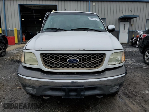 2003 Ford F-150 XL with VIN 1FTRX18L33NA43522, listed as a Copart auction lot 61197615 with 101,061 mi miles and Salvage title. Bid and sale history available at DreamBid. Image 5.