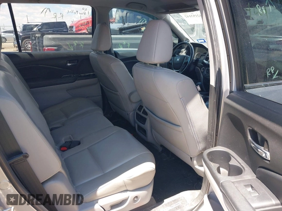 2018 Honda Pilot EX-L with VIN 5FNYF5H61JB008134, listed as a IAAI auction lot 42193142 with 100,254 mi miles and . Bid and sale history available at DreamBid. Image 8.