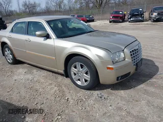 2006 Chrysler 300 Touring with VIN 2C3KK53G66H537795, listed as a IAAI auction lot 42157849 with 146,489 mi miles. Bid and sale history available at carsss.com. Image 1.