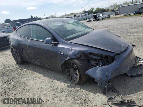 2021 Tesla Model Y Performance with VIN 5YJYGDEF2MF262273, listed as a Copart auction lot 50569245 with 90,879 mi miles and Salvage Title. Bid and sale history available at DreamBid. Image 4.