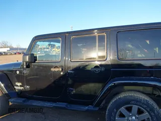 2014 Jeep Wrangler Unlimited Sahara with VIN 1C4BJWEG7EL322316, listed as a IAAI auction lot 41059508 with 144,662 mi miles. Bid and sale history available at carsss.com. Image 14.