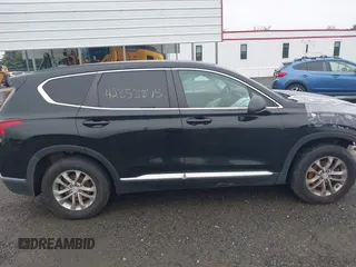 2020 Hyundai Santa Fe SE with VIN 5NMS2CAD8LH161464, listed as a IAAI auction lot 42353895 with 70,429 mi miles and . Bid and sale history available at DreamBid. Image 13.