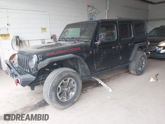 2021 Jeep Wrangler Unlimited Rubicon with VIN 1C4HJXFN2MW587168, listed as a IAAI auction lot 42472309 with 66,272 mi miles and . Bid and sale history available at DreamBid. Image 17.
