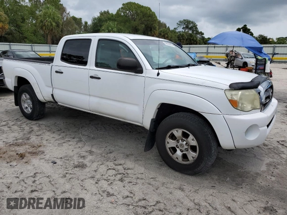 2010 Toyota Tacoma with VIN 3TMMU4FN1AM016612, listed as a Copart auction lot 59038495 with 127,448 mi miles and Clean title. Bid and sale history available at DreamBid. Image 4.