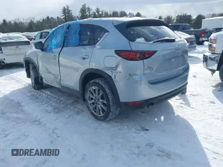 2021 Mazda CX-5 Grand Touring Reserve with VIN JM3KFBAY0M0377030, listed as a IAAI auction lot 41606709 with 39,590 mi miles. Bid and sale history available at carsss.com. Image 3.