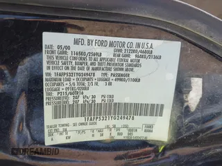 2000 Ford Taurus SE with VIN 1FAFP5321YG249478, listed as a IAAI auction lot 41686339 with 221,015 mi miles and . Bid and sale history available at DreamBid. Image 9.