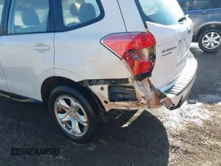 2016 Subaru Forester 2.5i with VIN JF2SJAAC9GG419620, listed as a IAAI auction lot 41751853 with 128,698 mi miles and . Bid and sale history available at DreamBid. Image 6.