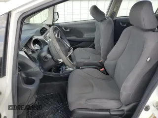 2013 Honda Fit с VIN JHMGE8H36DC045573, выставлен на аукционе Copart как лот 59525075 с пробегом 91 355 миль миль и Списание • Salvage title. История ставок и продаж доступна на DreamBid. Изображение 7.