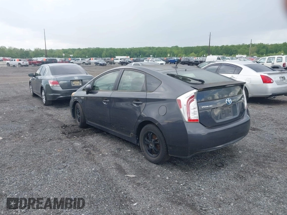 2013 Toyota Prius One with VIN JTDKN3DU8D1716993, listed as a IAAI auction lot 42202519 with 182,421 mi miles and . Bid and sale history available at DreamBid. Image 3.