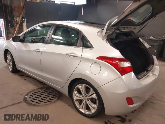 2013 Hyundai Elantra GT with VIN KMHD35LE2DU105677, listed as a IAAI auction lot 42027623 with 137,063 mi miles. Bid and sale history available at carsss.com. Image 3.