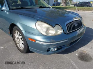 2004 Hyundai Sonata GLS with VIN KMHWF35H84A049046, listed as a IAAI auction lot 42071777 with 158,148 mi miles. Bid and sale history available at carsss.com. Image 12.