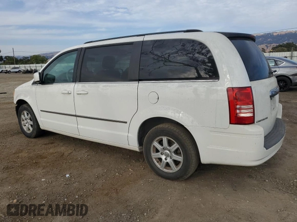 2010 Chrysler Town & Country Touring with VIN 2A4RR5D1XAR358799, listed as a Copart auction lot 71979624 with 213,523 mi miles and Salvage Title. Bid and sale history available at DreamBid. Image 2.
