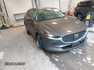 2021 Mazda CX-30 Select with VIN 3MVDMBBL8MM312187, listed as a IAAI auction lot 41100660 with 52,265 mi miles. Bid and sale history available at carsss.com. Image 1.
