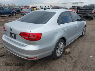 2015 Volkswagen Jetta Sedan 1.8T SE with VIN 3VWD17AJ4FM302117, listed as a IAAI auction lot 41917138 with 122,946 mi miles. Bid and sale history available at carsss.com. Image 4.