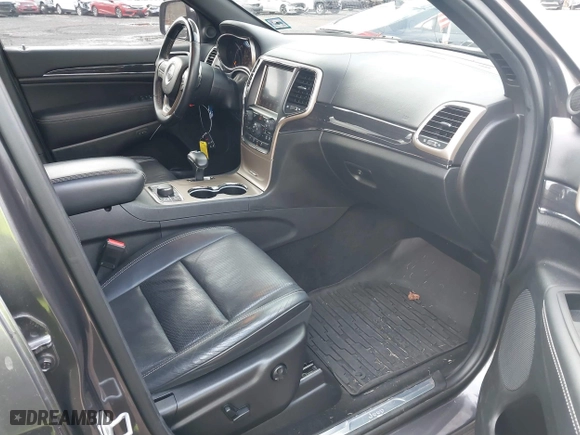 2014 Jeep Grand Cherokee Overland with VIN 1C4RJFCG5EC329377, listed as a IAAI auction lot 40822324 with 106,222 mi miles. Bid and sale history available at carsss.com. Image 5.