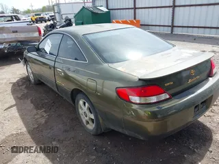1999 Toyota Solara SE with VIN 2T1CF22PXXC247611, listed as a IAAI auction lot 41863240 with 153,823 mi miles. Bid and sale history available at carsss.com. Image 3.