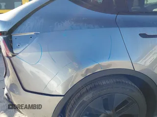 2025 Tesla Model Y Long Range with VIN 7SAYGDED7SA376233, listed as a IAAI auction lot 41777876 with 70 mi miles and . Bid and sale history available at DreamBid. Image 20.