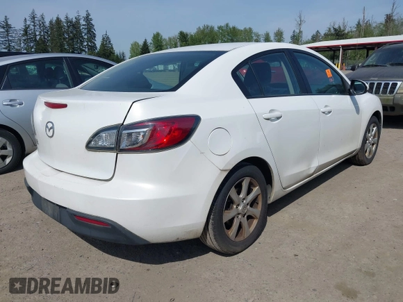 2011 Mazda Mazda3 i Sport with VIN JM1BL1UF8B1391948, listed as a IAAI auction lot 42138405 with 291,606 mi miles. Bid and sale history available at carsss.com. Image 4.