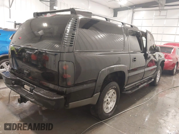 2003 Chevrolet Suburban Z71 with VIN 3GNFK16Z33G275630, listed as a IAAI auction lot 41937310 with 224,207 mi miles. Bid and sale history available at carsss.com. Image 4.