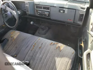 1991 GMC Sonoma with VIN 1GTCS14RXM2559524, listed as a Copart auction lot 79871374 with 228,691 mi miles and Salvage Title. Bid and sale history available at DreamBid. Image 8.