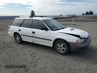 1997 Subaru Legacy L with VIN 4S3BK4359V7309059, listed as a Copart auction lot 59600835 with 136,620 mi miles and Salvage title. Bid and sale history available at DreamBid. Image 4.
