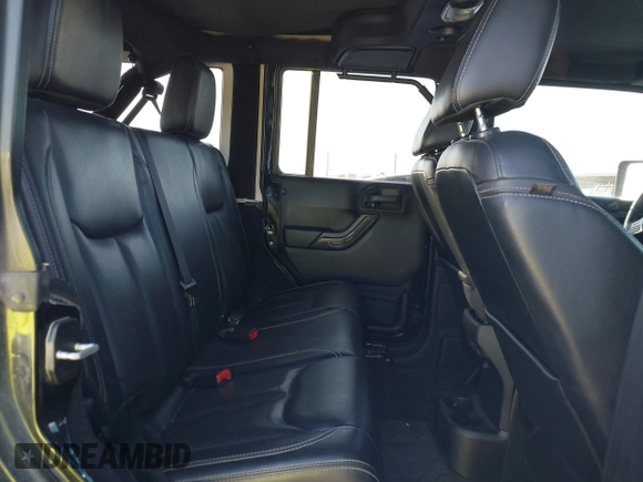 2015 Jeep Wrangler Unlimited Rubicon Hard Rock with VIN 1C4HJWFG7FL602344, listed as a IAAI auction lot 42011914 with 109,238 mi miles and . Bid and sale history available at DreamBid. Image 8.
