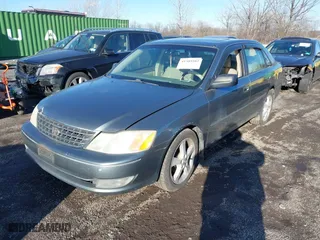 2003 Toyota Avalon XL with VIN 4T1BF28BX3U277269, listed as a IAAI auction lot 41589582 with 129,895 mi miles. Bid and sale history available at carsss.com. Image 2.