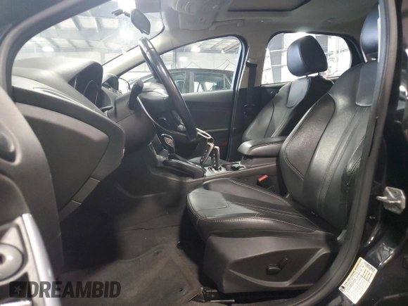 2014 Ford Focus Titanium with VIN 1FADP3N2XEL131392, listed as a Copart auction lot 61665025 with 105,597 mi miles and Salvage title. Bid and sale history available at DreamBid. Image 7.
