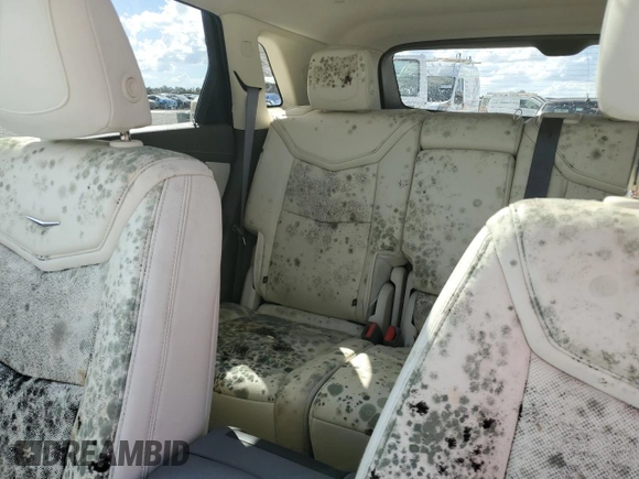 2019 Cadillac XT5 Luxury AWD z VIN 1GYKNDRS4KZ189847, wystawiony jako Copart lot #55382505 z przebiegiem Nie podano mil oraz Nie do naprawy • Non repairable. Historia ofert i sprzedaży dostępna na DreamBid. Obrazek 10.