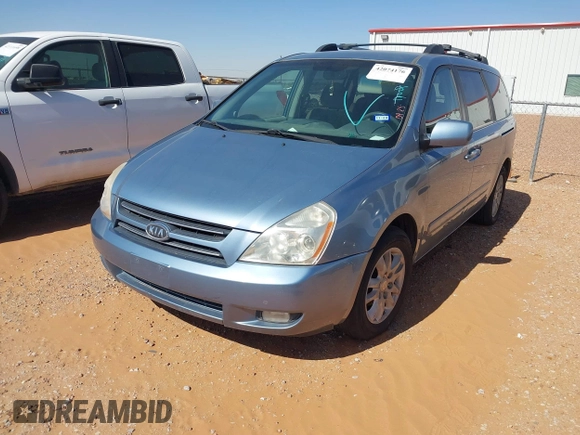 2006 Kia Sedona LX with VIN KNDMB233666054213, listed as a IAAI auction lot 42074176 with 168,080 mi miles. Bid and sale history available at carsss.com. Image 2.