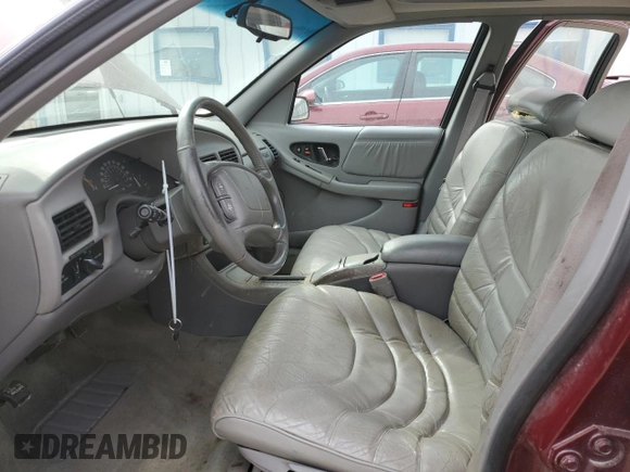 1996 Buick Regal with VIN 2G4WF52K9T1417982, listed as a Copart auction lot 49963815 with 98,269 mi miles and Salvage Title. Bid and sale history available at DreamBid. Image 7.