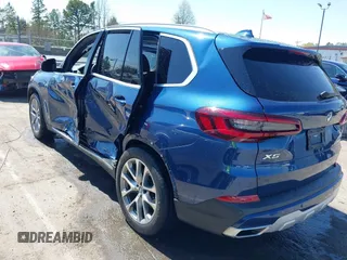 2021 BMW X5 sDrive40i with VIN 5UXCR4C03M9F14479, listed as a IAAI auction lot 41884878 with 1 mi miles. Bid and sale history available at carsss.com. Image 3.