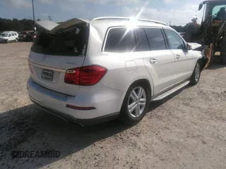 2014 Mercedes-Benz GL 450 z VIN 4JGDF7CE2EA287810, wystawiony jako IAAI lot #39696896 z przebiegiem 181 816 mil mil oraz . Historia ofert i sprzedaży dostępna na DreamBid. Obrazek 4.