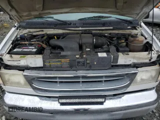 2000 Ford Econoline Cargo Recreational z VIN 1FDRE14L3YHA17676, wystawiony jako Copart lot #58571465 z przebiegiem 174 129 mil mil oraz Szkoda całkowita • Salvage title. Historia ofert i sprzedaży dostępna na DreamBid. Obrazek 12.
